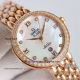 AAA replica Omega De Ville rose gold diamond bezel pearl shell face ladies watch (3)_th.jpg